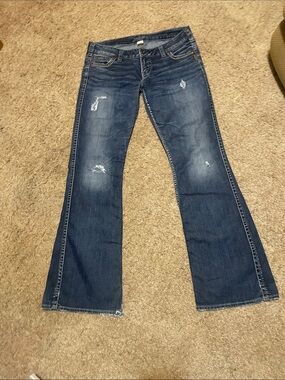 Silver Jeans Dark Blue Flared Distressed Jeans